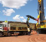 Plantman’s Mack Metroliner 8x4 Crane Truck (left) can replace drill rods semi-autonomously, and can be controlled from a distance, via remote control.