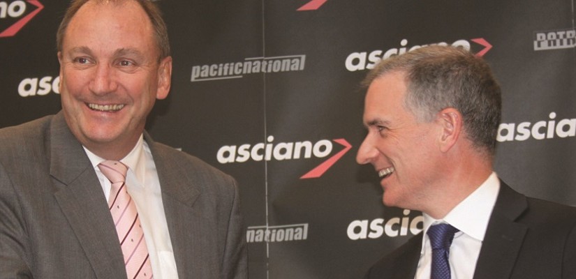 Asciano CEO John Mullen and Brookfield Infrastructure CEO Sam Pollock shaking hands earlier this year over the proposed acquisition. Photo: Danielle Shaw